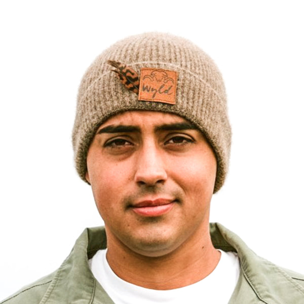 Man wearing a brown knit weka beanie - Wyld New Zealand